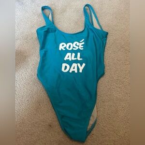 Women's bathing suit, size M/L, turquoise. Barely worn.